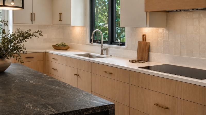 Coordinate Countertops, Sink, and Backsplash With the Cabinets